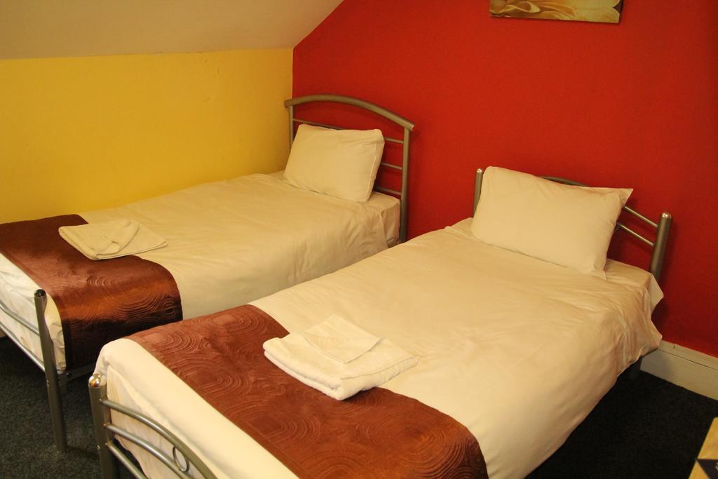 London Olympus Hotel Nirvana Camera foto